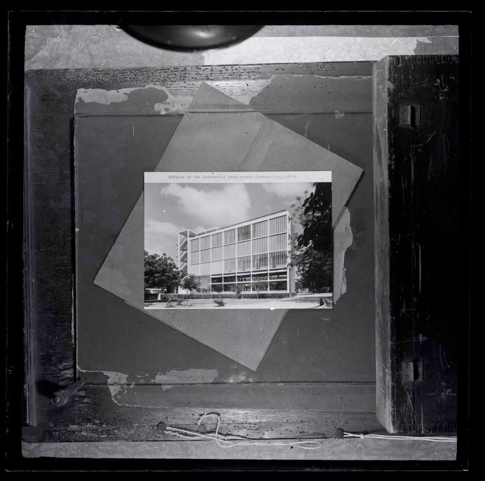 DTA Lantern Slide Library. Slide taken from an unidentified publication, showing a photograph of the Offices of the Industrial Development Corporation in Accra, Ghana.