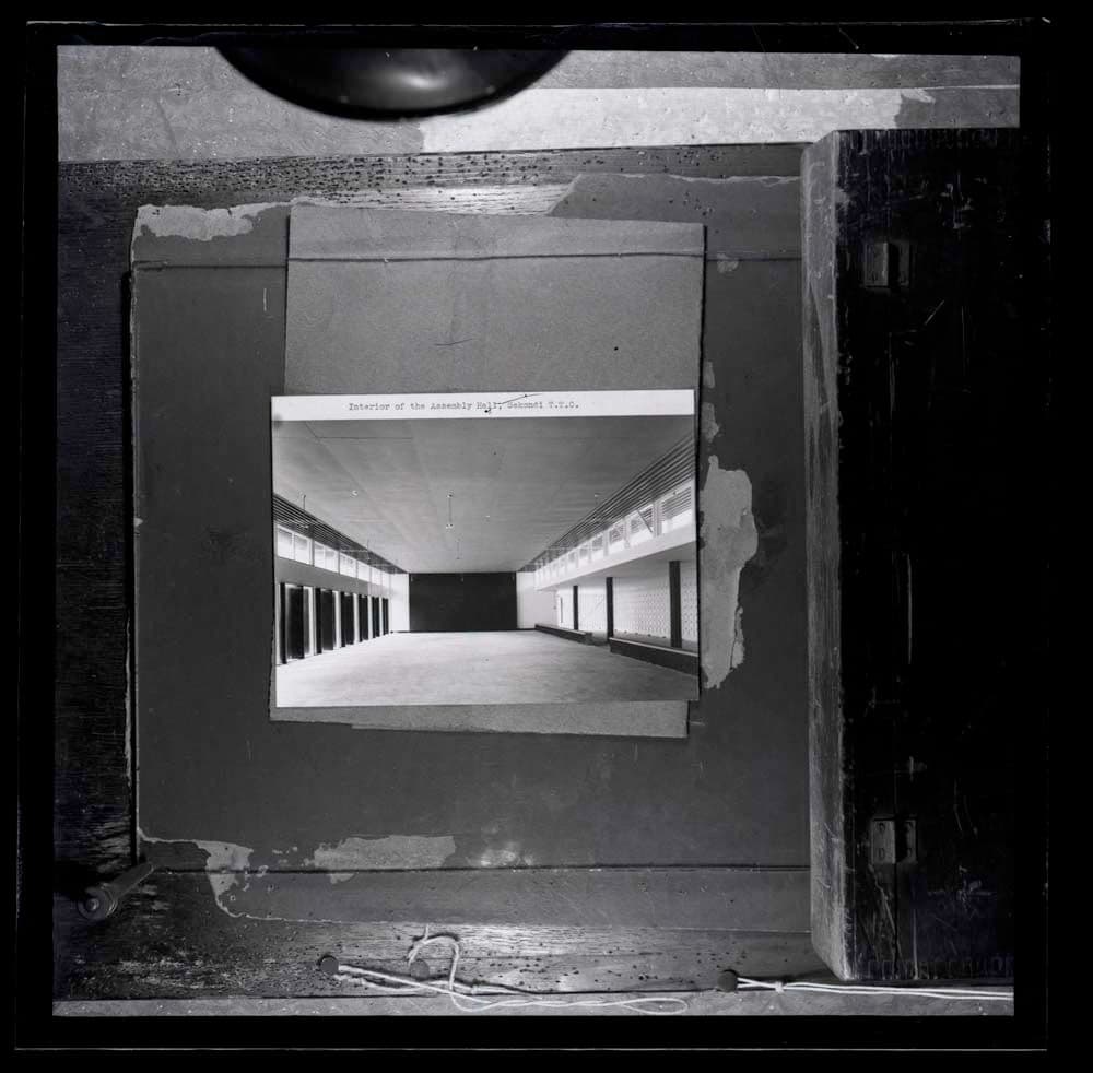 DTA Lantern Slide Library. Slide taken from an unidentified publication, showing a photograph of the interior of the assembly hall of Fijai Senior High School in Sekondi-Takoradi, Ghana. 