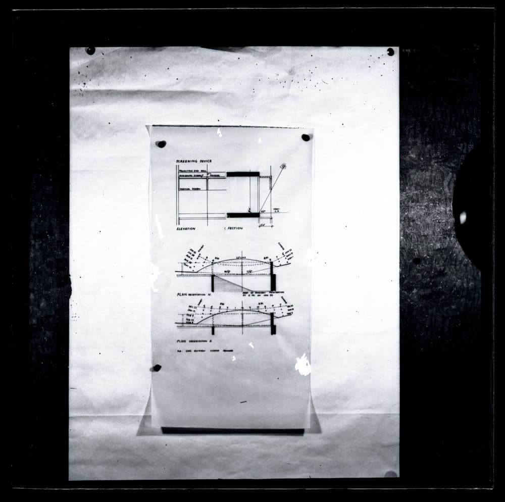 DTA Lantern Slide Library. Slide taken from an unidentified publication, showing a photograph of hand drawn plans, elevation and a section of a screening device.