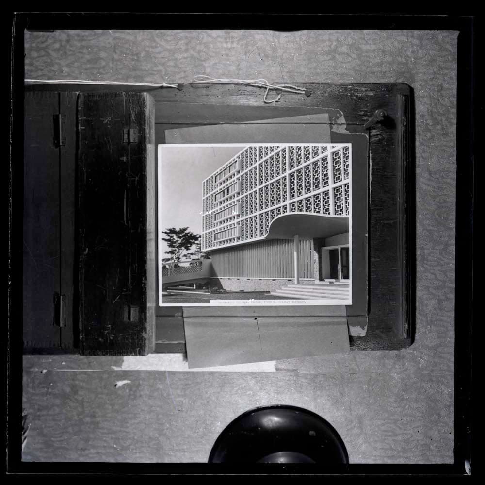 DTA Lantern Slide Library. Slide taken from an unidentified publication, showing a photograph  of the entrance for the Kenneth Dike Library of University College in Ibadan, Nigeria. 