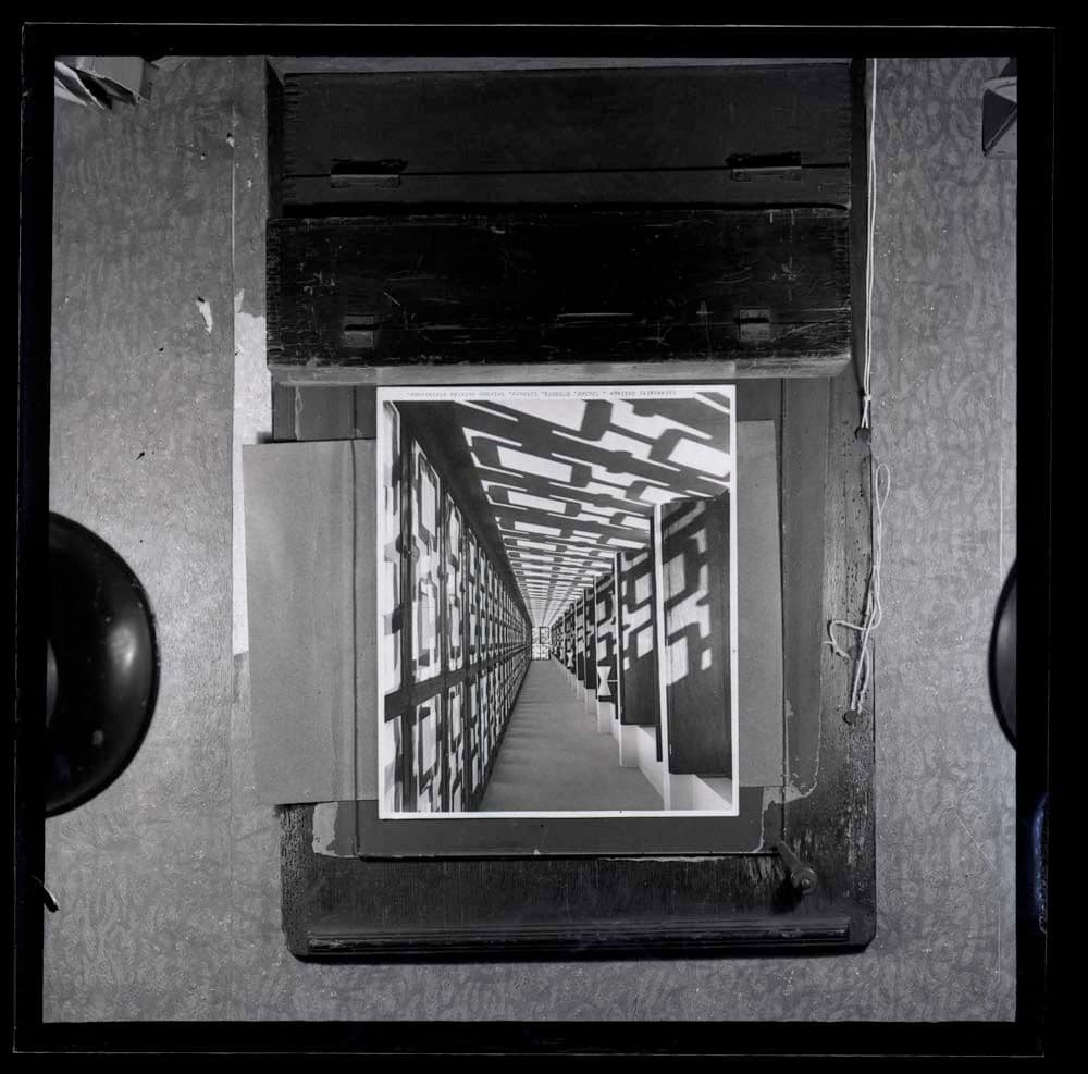 DTA Lantern Slide Library. Slide taken from an unidentified publication, showing a photograph  of the balcony outside of the library stock room of the Kenneth Dike Library of University College in Ibadan, Nigeria.