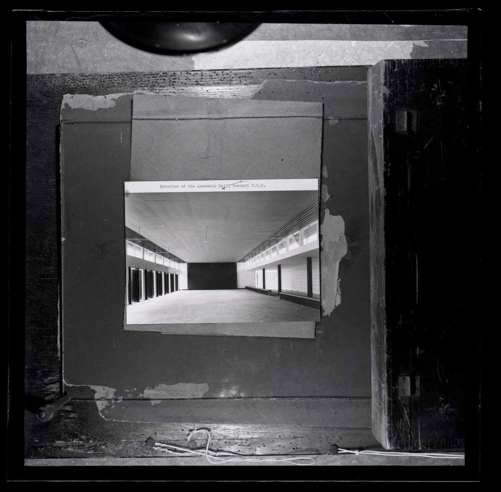 DTA Lantern Slide Library. Slide taken from an unidentified publication, showing a photograph of the interior of the assembly hall of Fijai Senior High School in Sekondi-Takoradi, Ghana. 